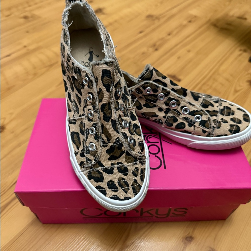 Corky’s leopard print slip on sneakers